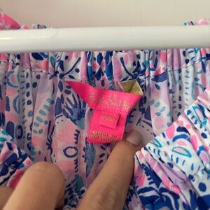 Loose fitting shoulder top